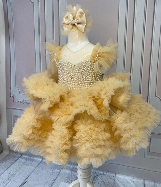 "Patricia Ruffle Dress - Front view showing elegant ruffle details and flattering silhouette"